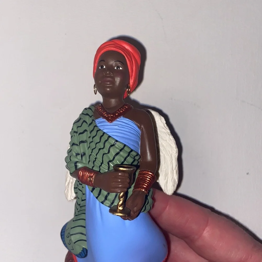 Vintage 1997 Hallmark Keepsake ornament from the A Celebration of Angels series.